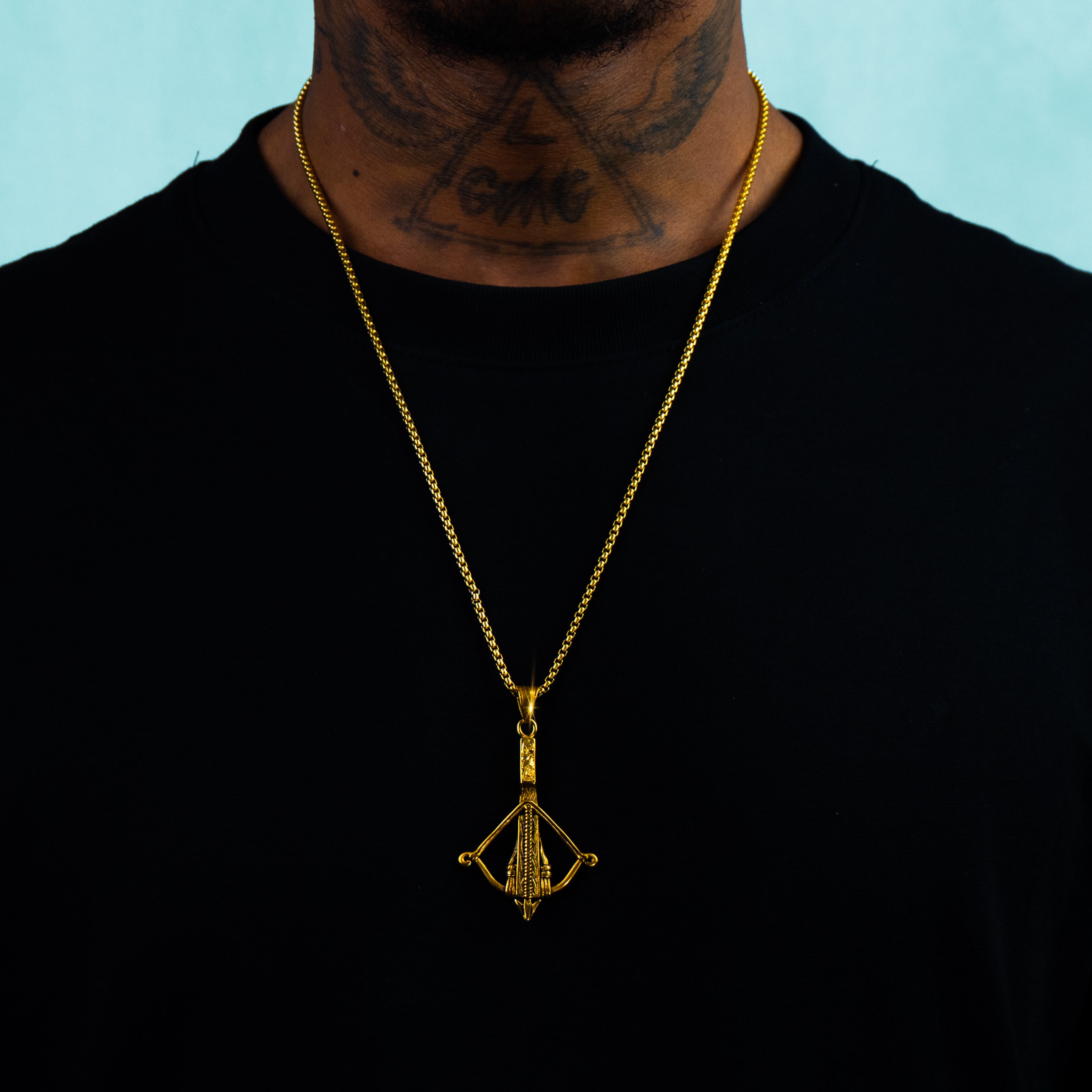 Colgante Ballesta Oro 18K