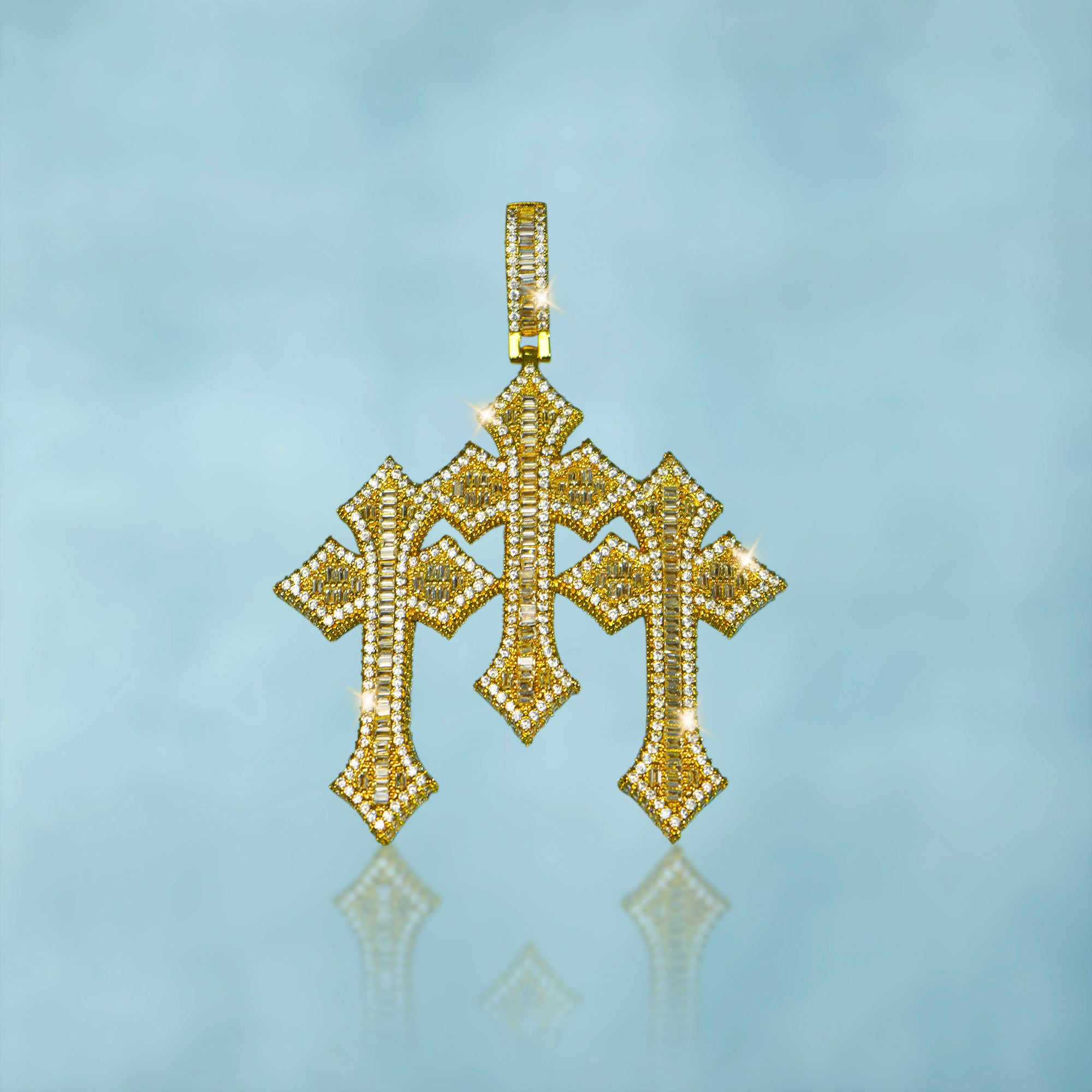 Colgante Cruz Triple Baguettes Oro 18K