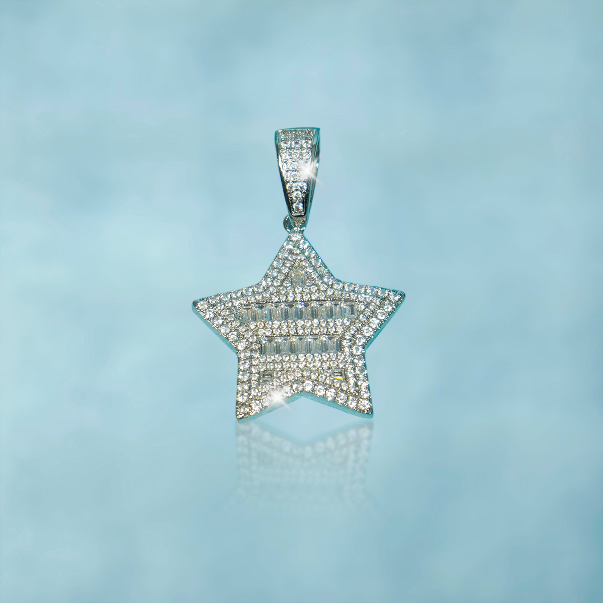 Colgante Estrella Baguettes Oro Blanco